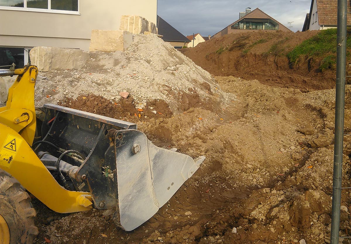 Foto von Erdarbeiten mit Bagger